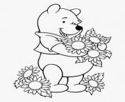Coloriage winnie de pooh aime les fleurs